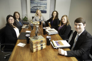 Personal injury legal team in conference room in Nashville office. 